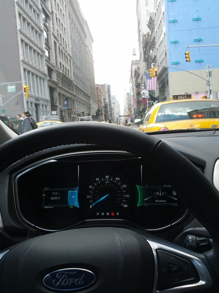 View over the dashboard of a Ford Fusion in Manhattan